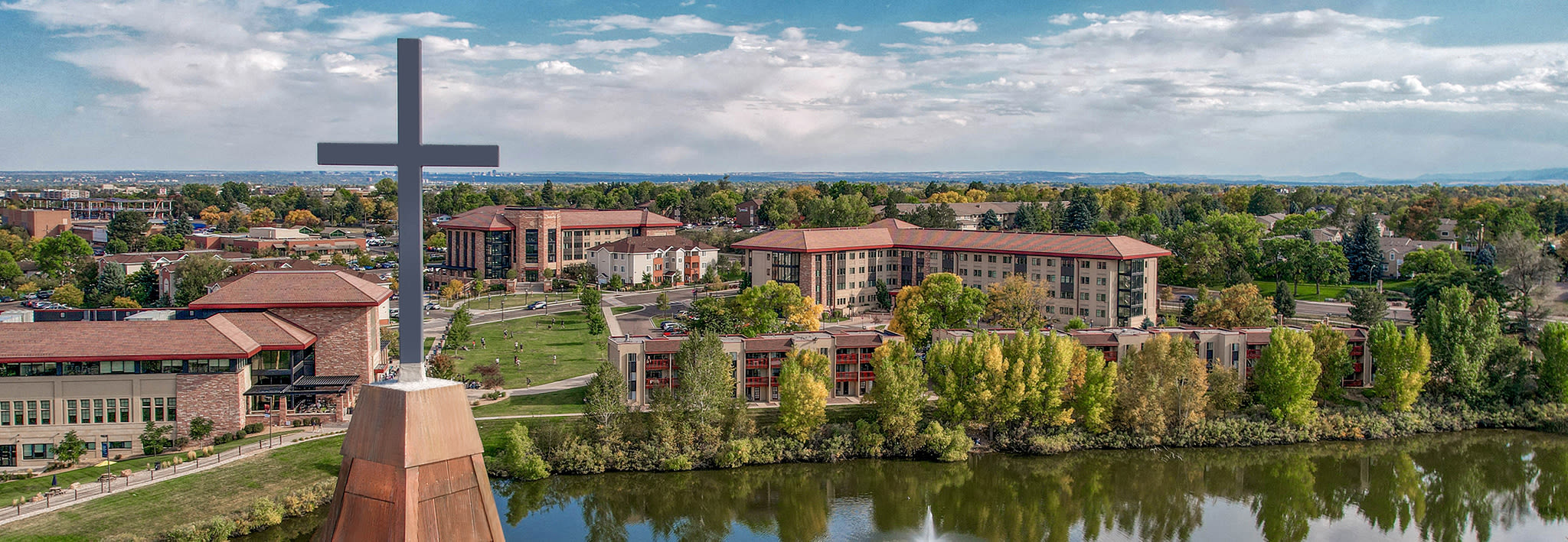 The Armstrong Center steeple in the foreground with CCU Campus in background