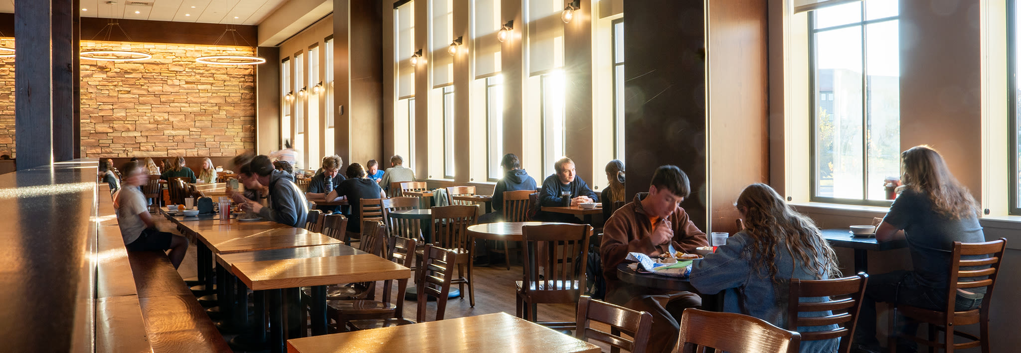 Students eating in the cafeteria.