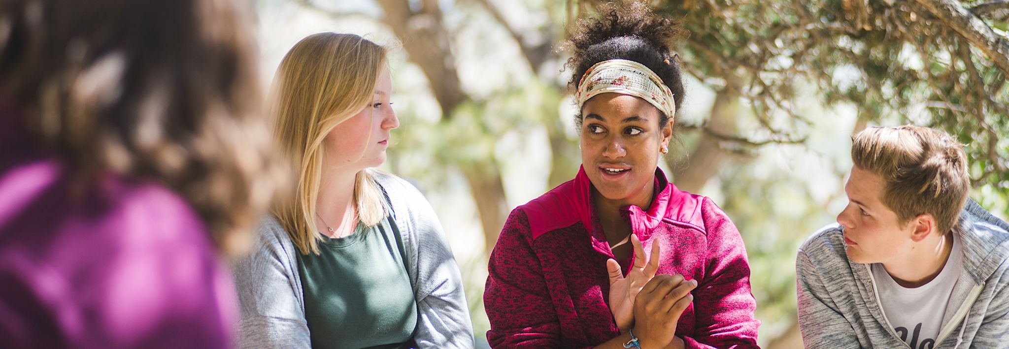 Students talking at a CCU retreat. 