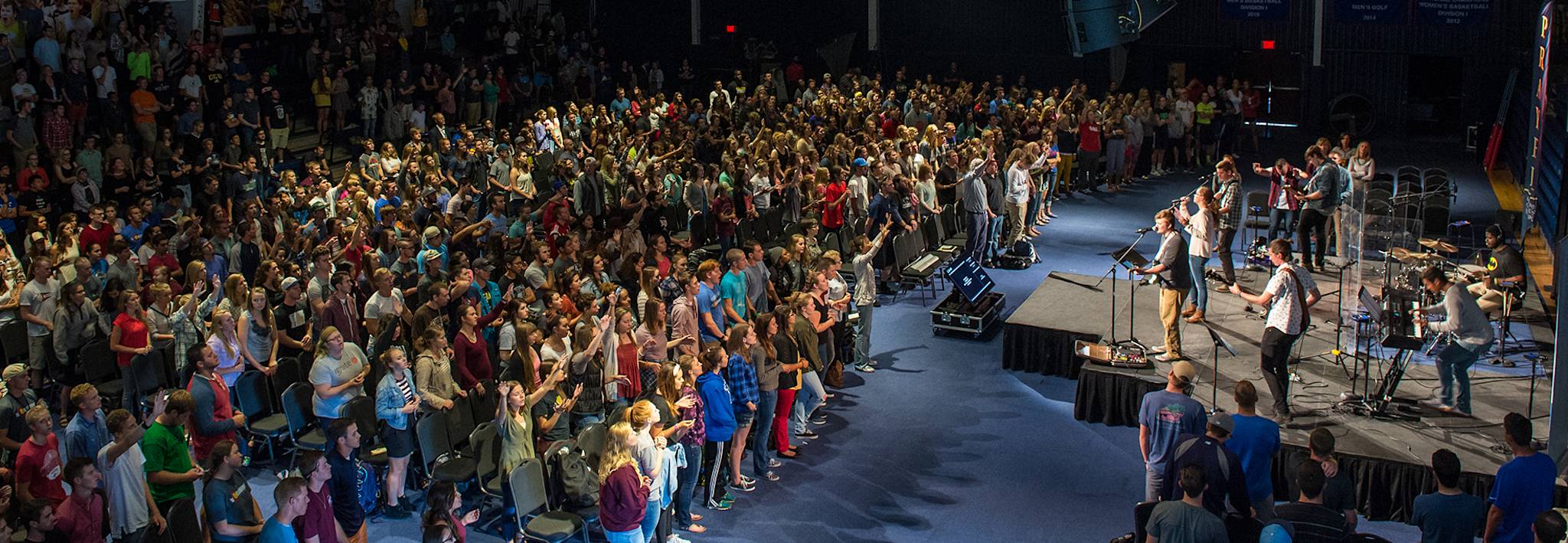 Colorado Christian University students worshiping in chapel.