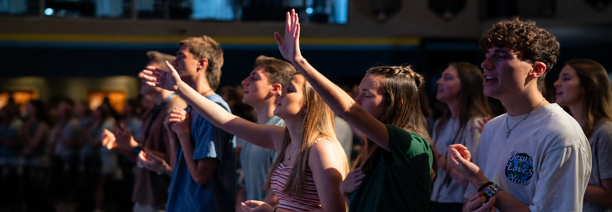 Colorado Christian University students worshiping in chapel.