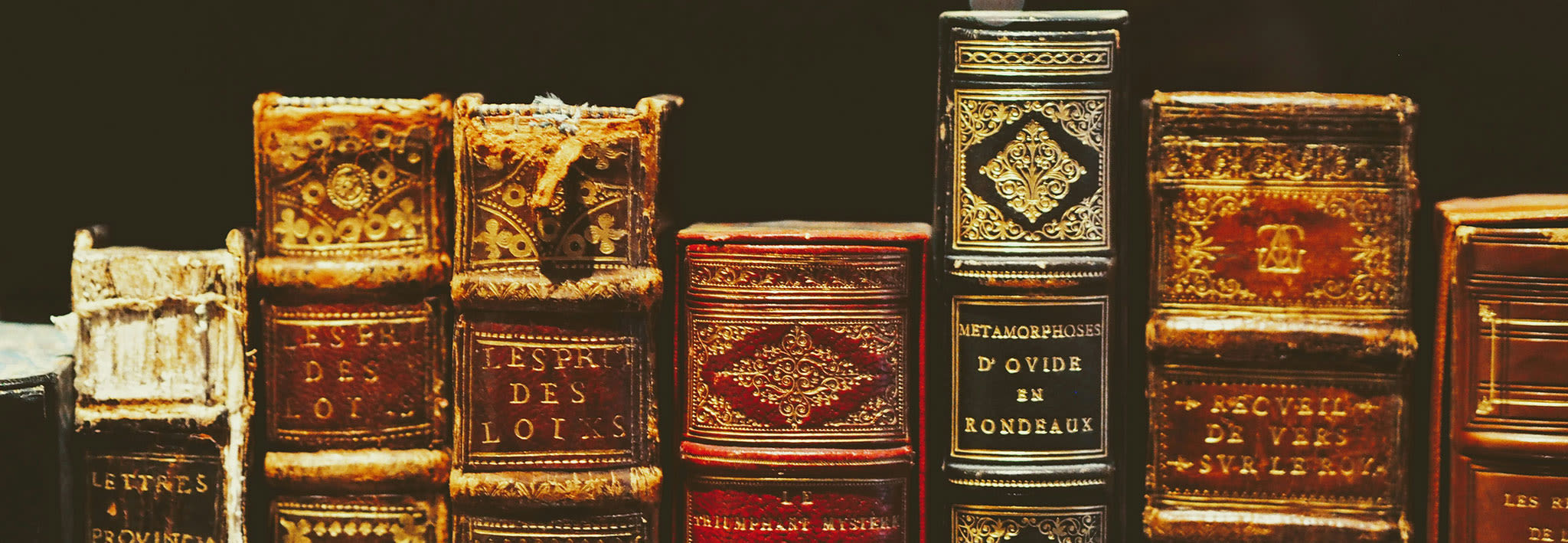 stack of old leather bound books
