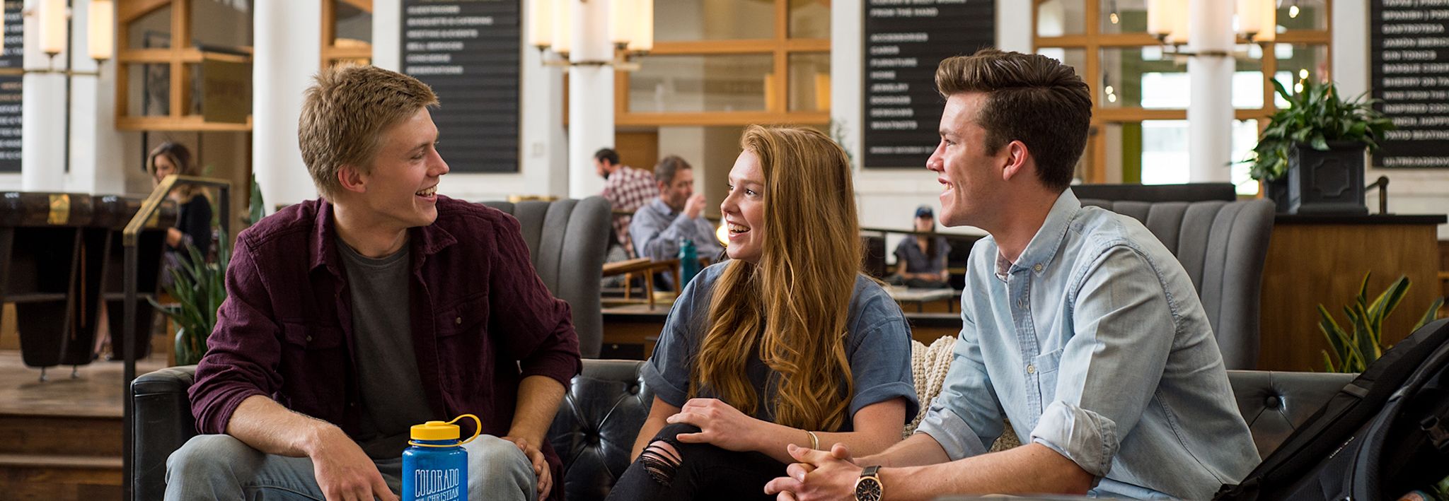 Colorado Christian University students talking in Denver. 