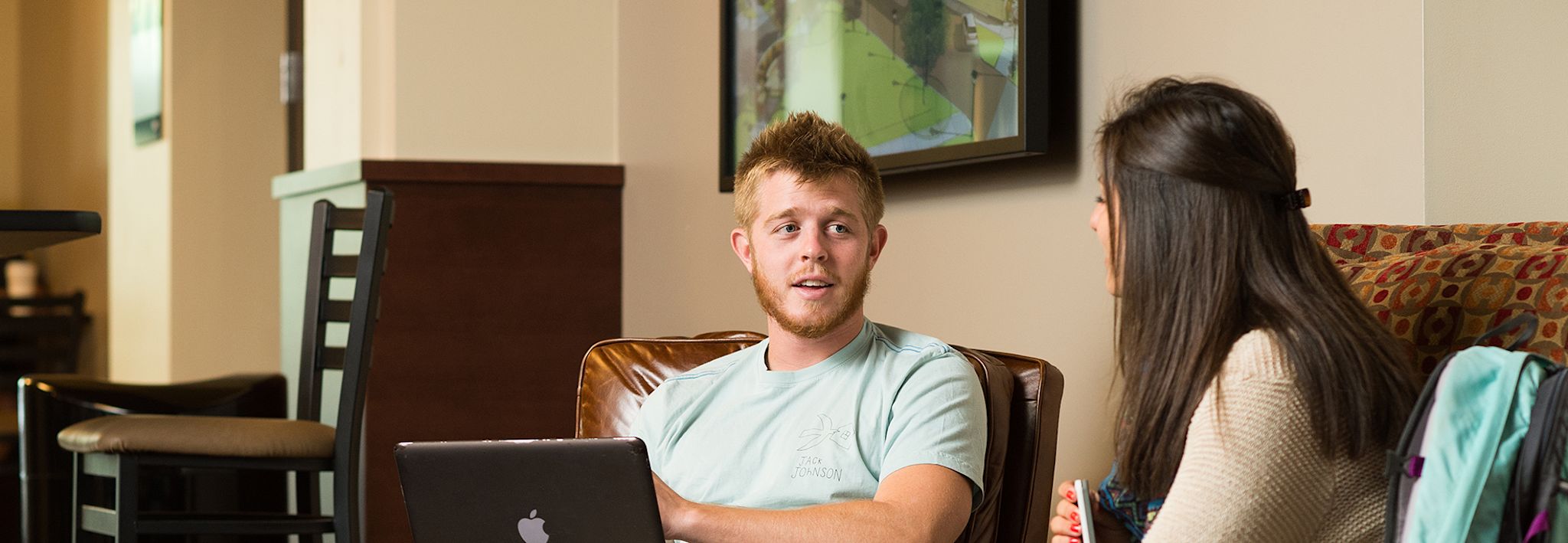 Colorado Christian University students working together on a project. 