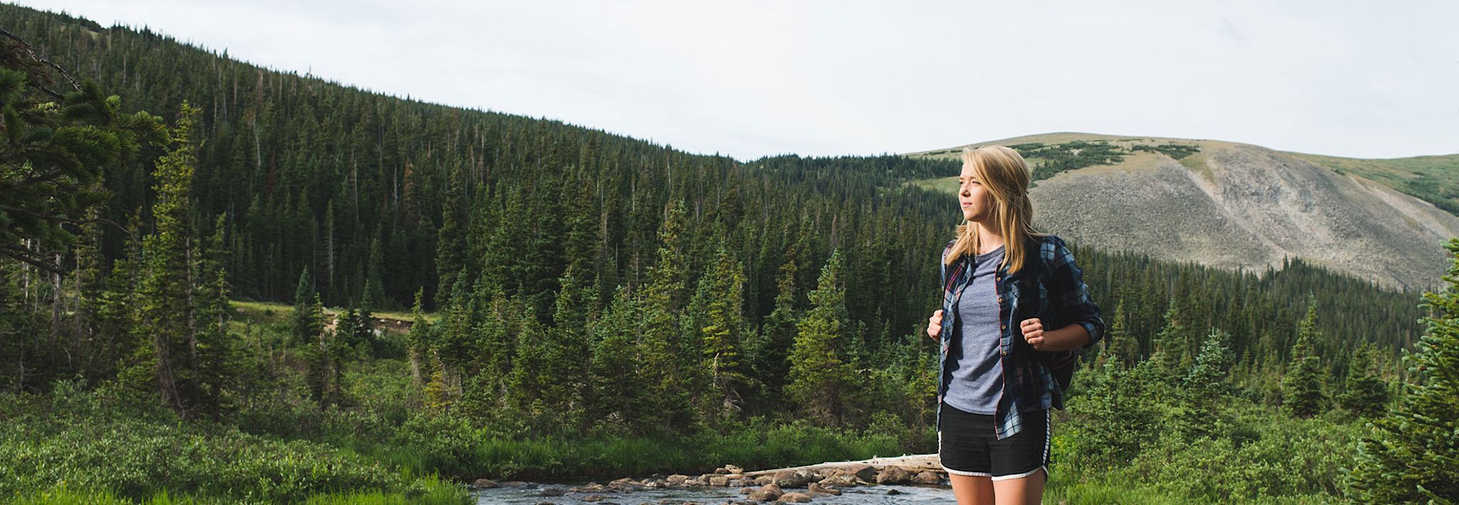 Student hiking in the mountains near CCU.