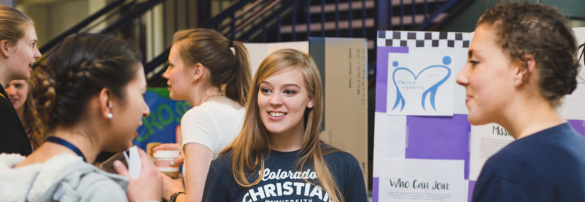 CCU students discussing service projects.