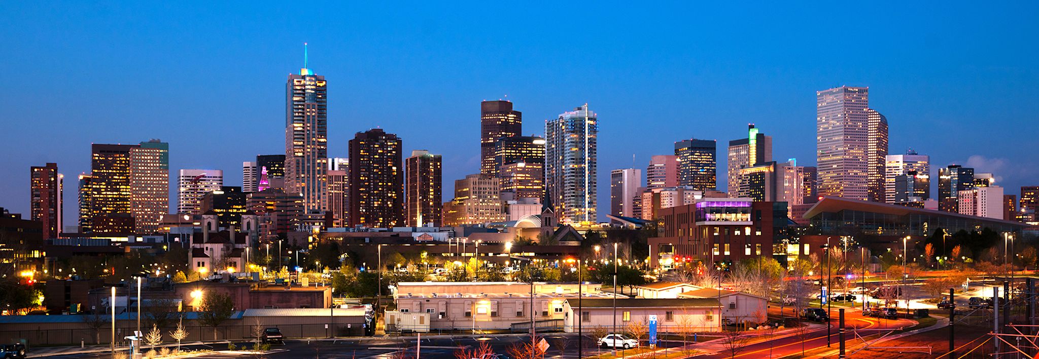 Denver city lights at dusk.