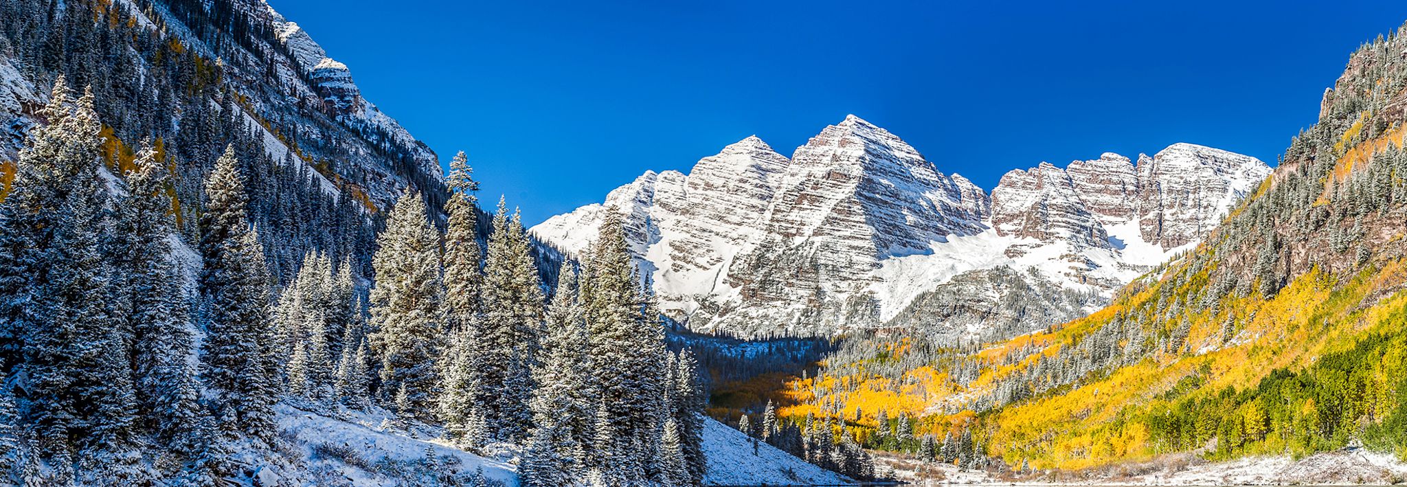 Fall and winter collide in this outstanding picture of the Maroon Bells, located in Colorado. 