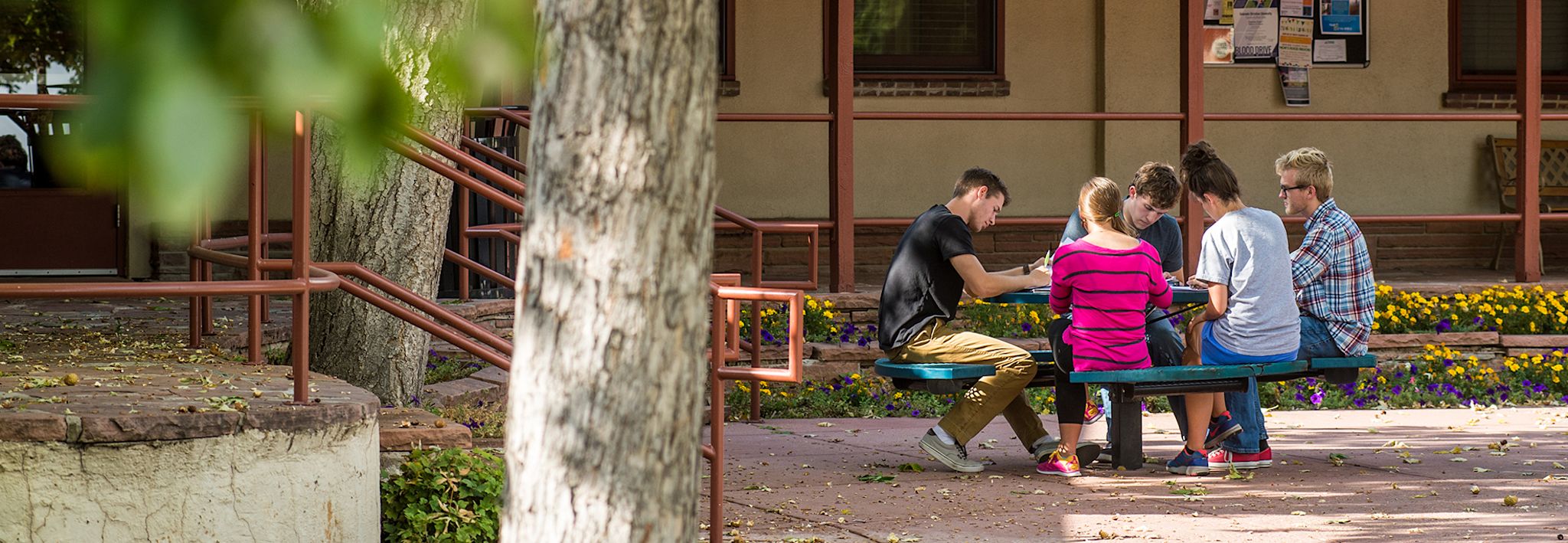 CCU students meeting outside of Beckman. 