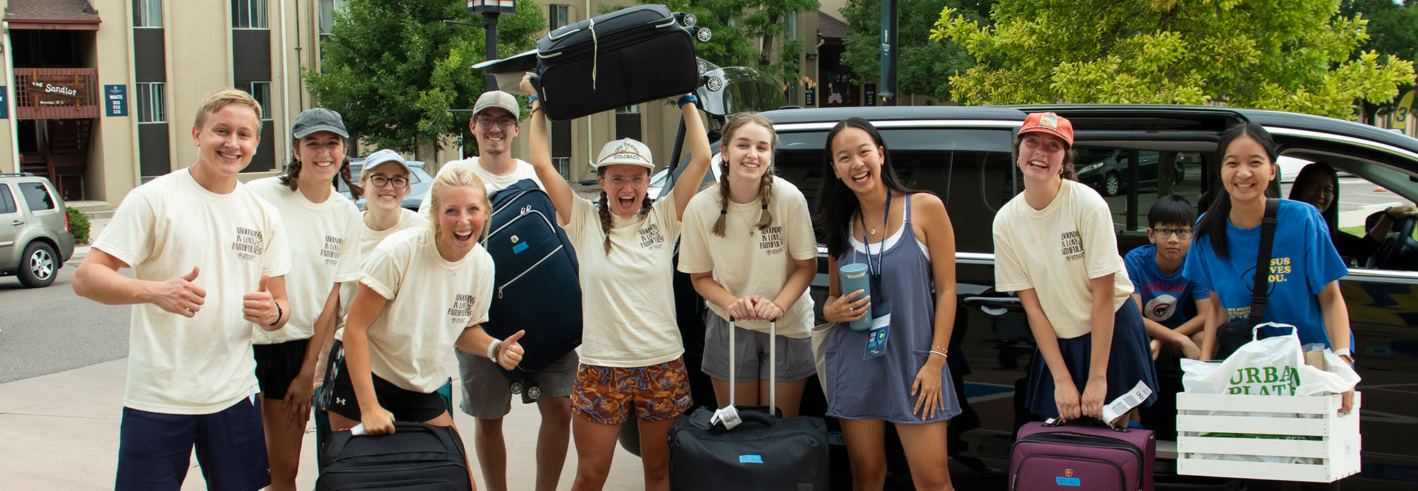 group of students smiling and welcoming ccu freshmen