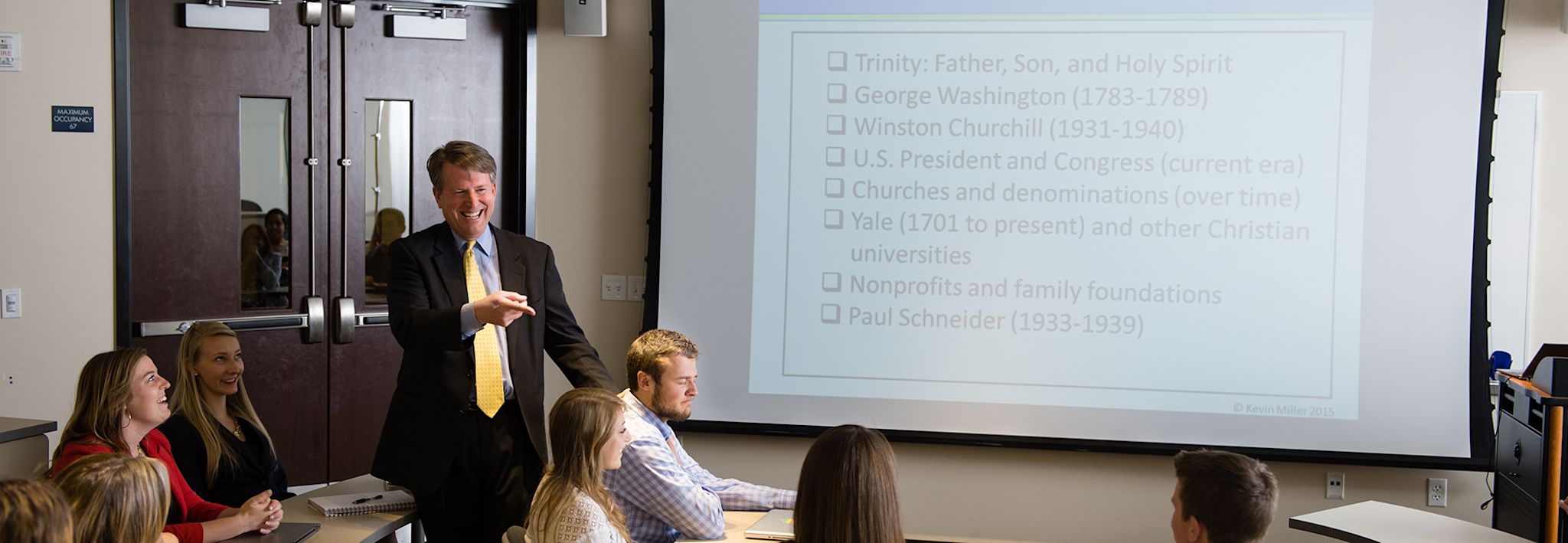 CCU Professor Miller teaching a business class.