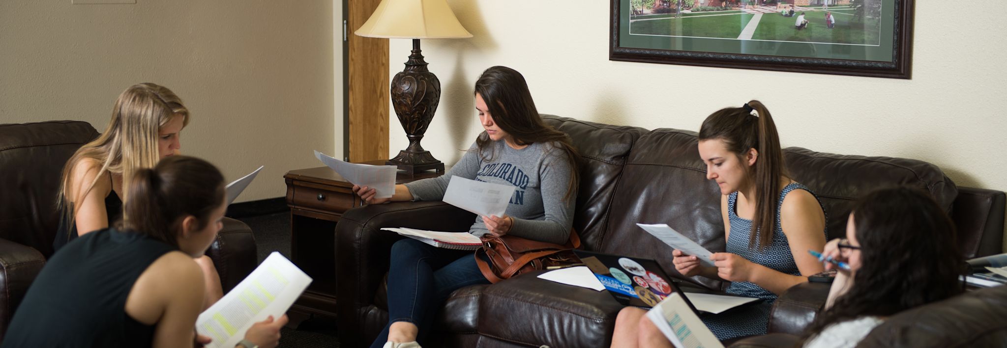 CCU students studying for an exam in their on campus housing. 