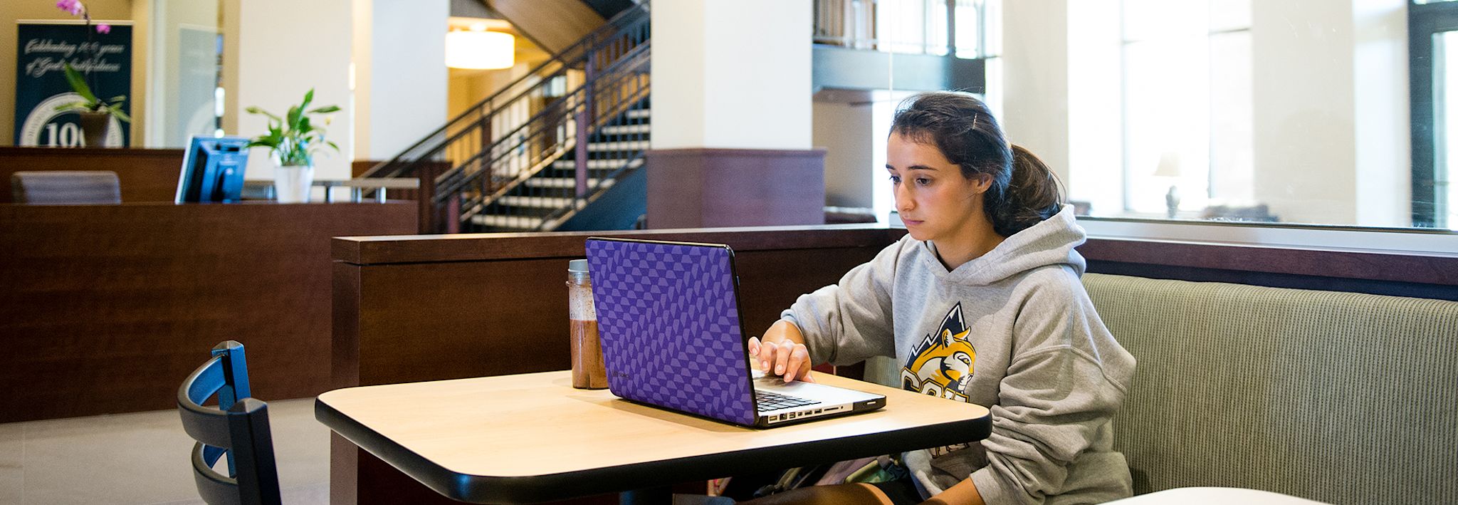 CCU student studying in Food for Thought.