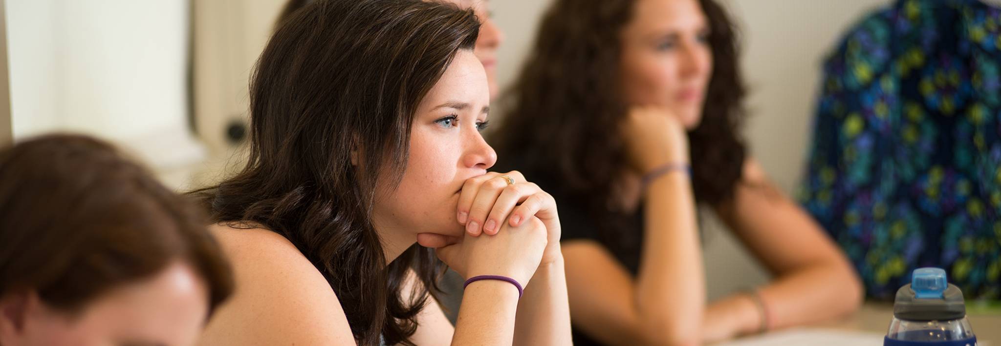 A CCU student sitting in a theology class. 