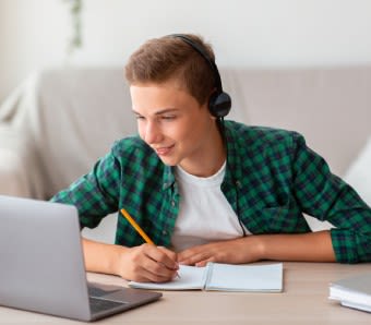high school boy on laptop