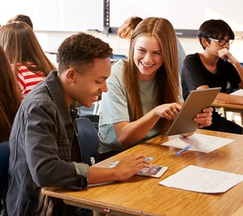 two high school students in the classroom