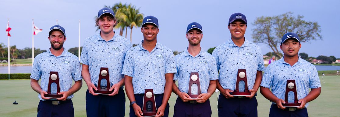 golf team with trophies