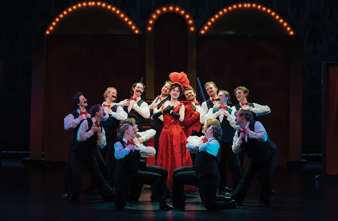 Cast members of Hello, Dolly! pose during a dress rehearsal.