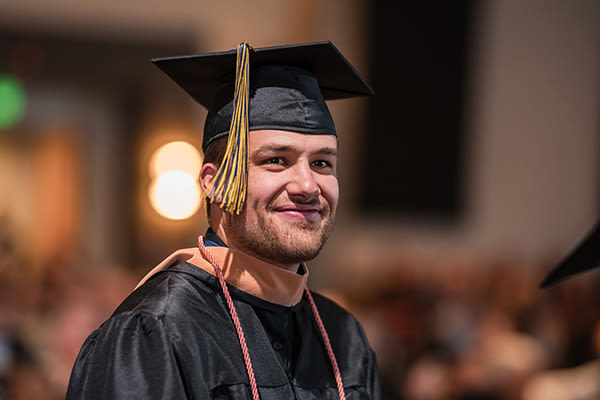smiling male graduate