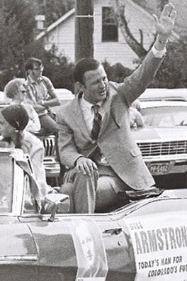 bill armstrong waving in parade