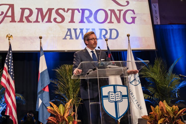 Wil Armstrong speaking at award ceremony