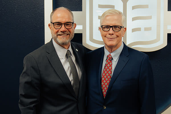 Jeremy S. Adams eric hogue standing with hugh hewitt at the presidents speaker series