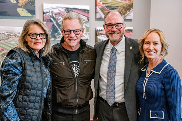 the hogues and the chapmans smiling together