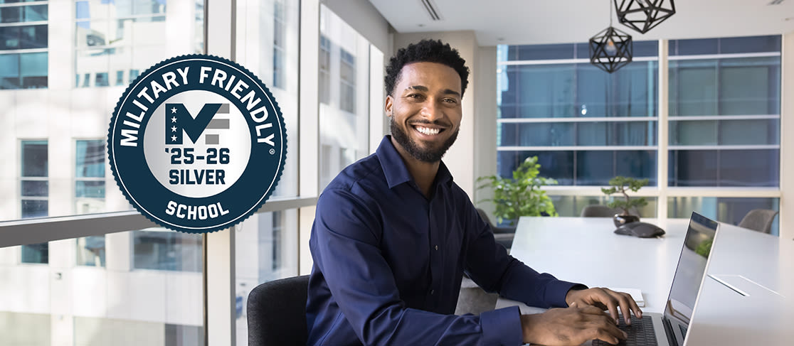 adult man working at a desk