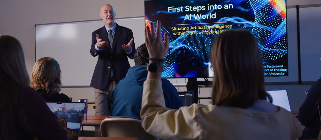 Dr. Kotter takes a student's question in the Quarry Innovation Lab (slide 4 of 6)