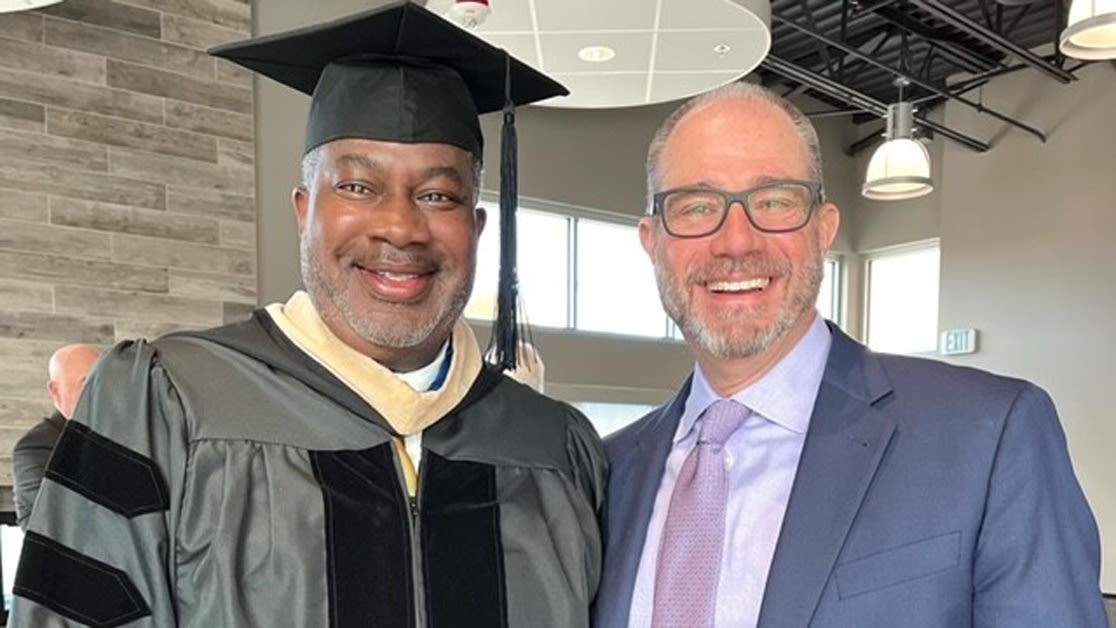 2022 Commencement speaker Danny Moore '08 and Eric Hogue