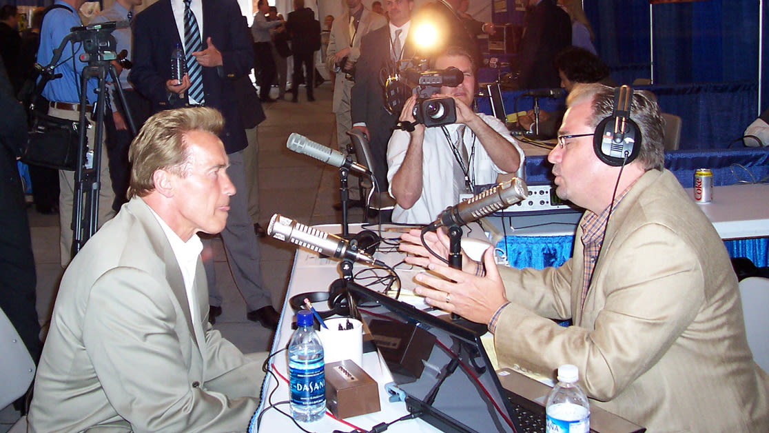 Eric Hogue interviewing Arnold Schwarzenegger on the Eric Hogue Show (c. 2003)