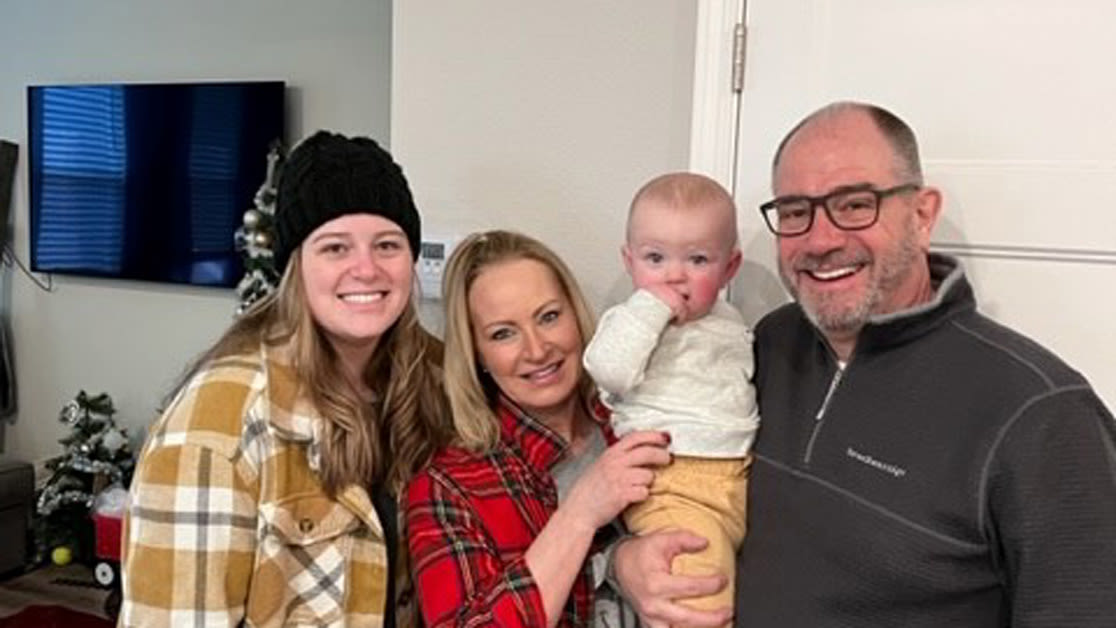 Eric and Tammy Hogue with daughter Kourtnee and grandson Hudson