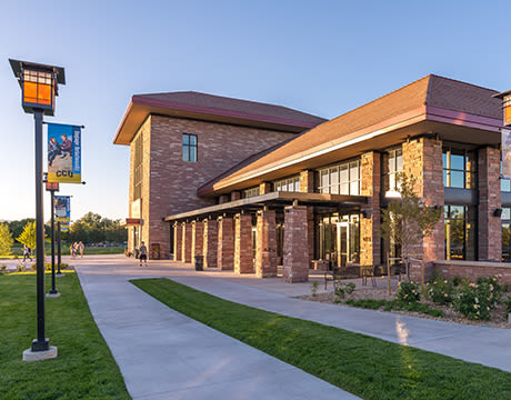 Exterior shot of campus building and lampposts