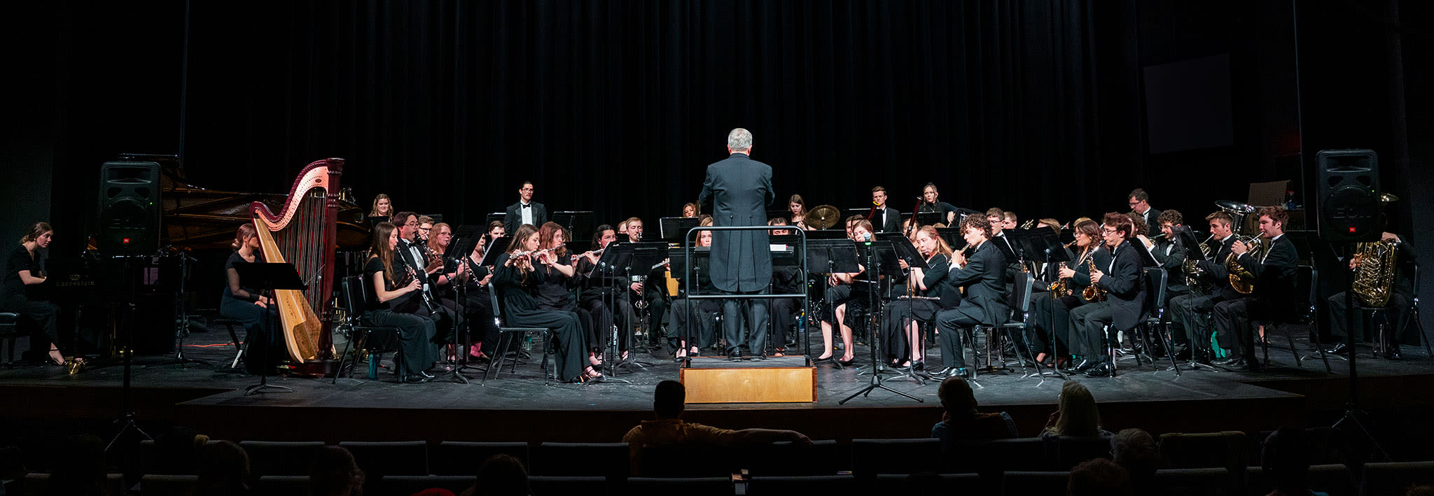ccu orchestra performing on stage