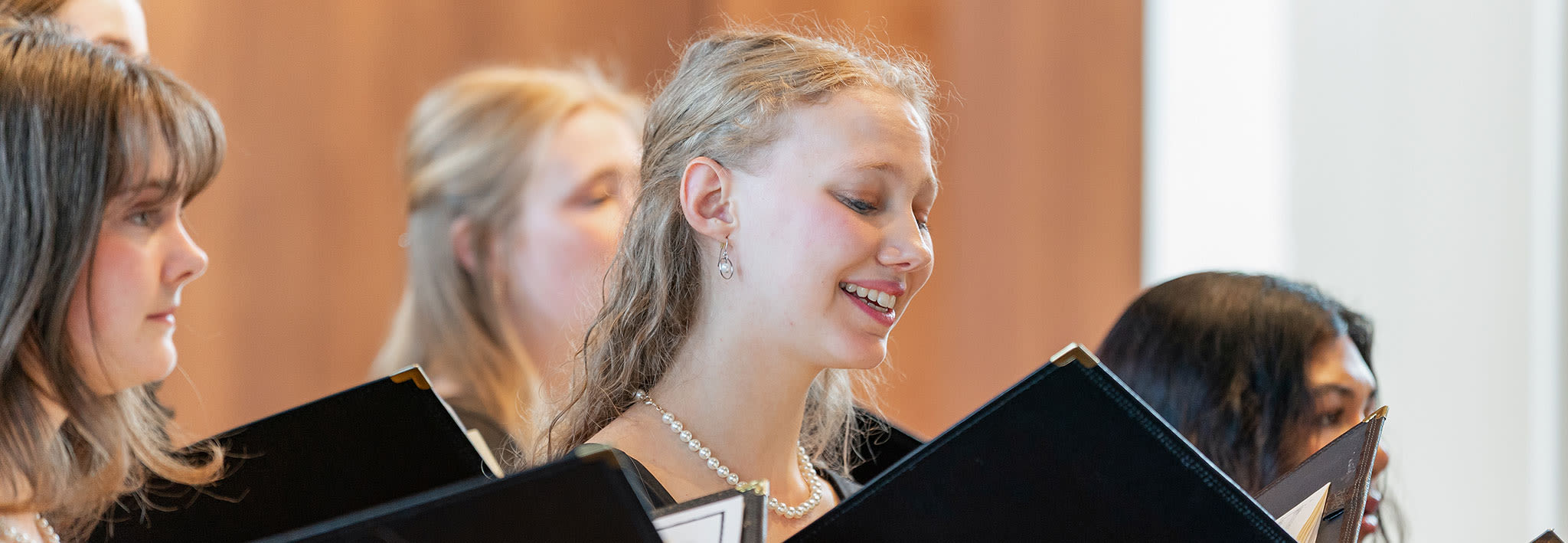 female singers performing in a choir