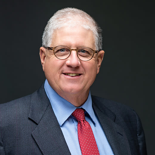 Circular headshot image of Mark Heckelmann