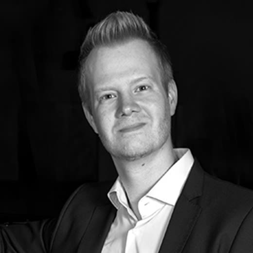 Circular headshot image of Dr. Aaron Stampfl