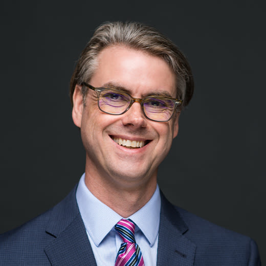 Circular headshot image of Dr. Richard Niezen