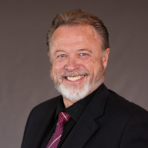Circular headshot image of Steven Taylor