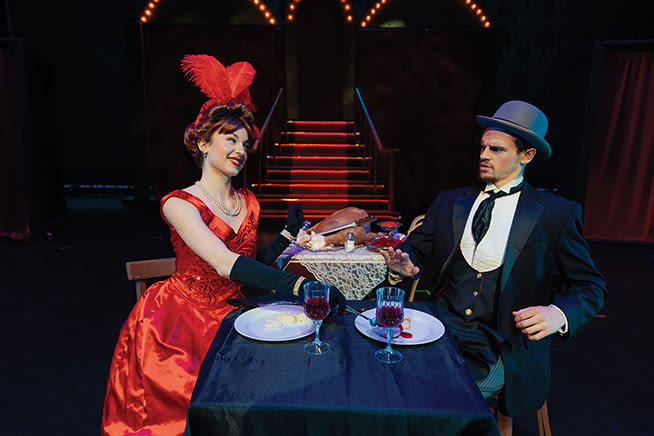 Two cast members of Hello, Dolly! act during a dress rehearsal scene