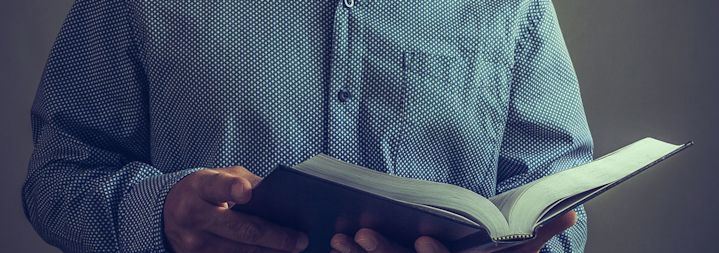 a person holding the bible