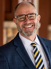 president eric hogue smiling