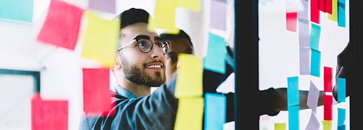 people drafting up ideas for starting a business