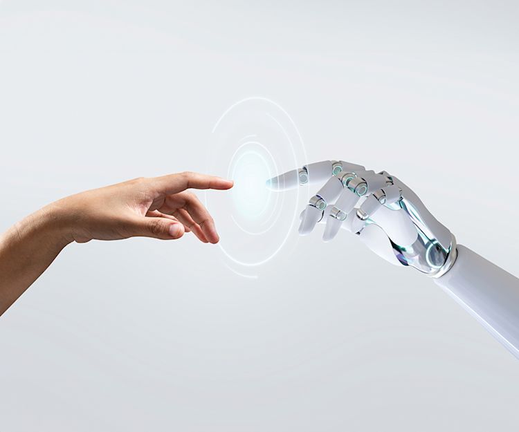 human hand touching a robot hand