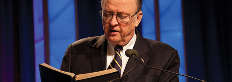Bill Armstrong reading from the Bible