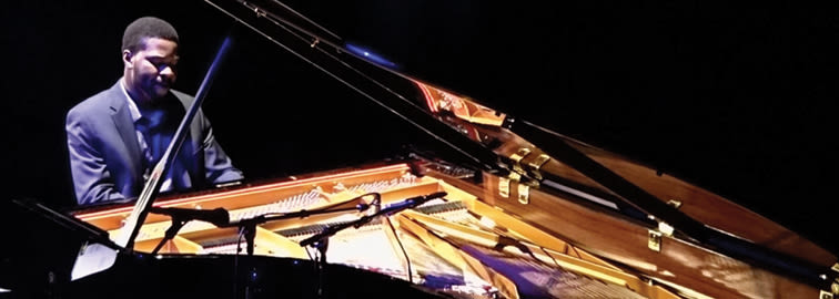 CCU student playing the piano
