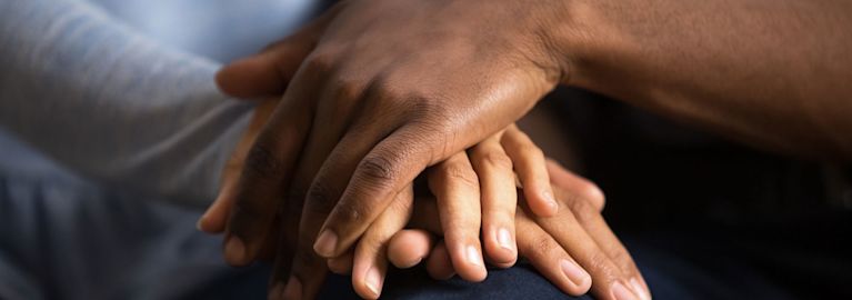 a couple holding hands