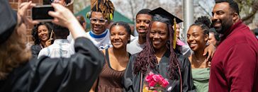CCU Online graduate with family at Commencement