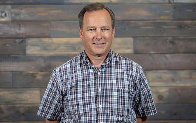 Headshot photo of Dr. Dean Ridings