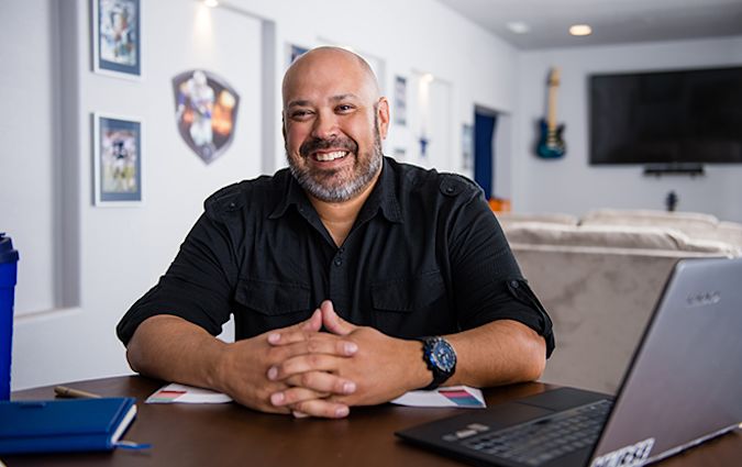 Headshot photo of Joe DeLaCruz